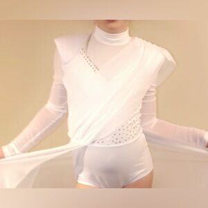 White with stones and mesh sleeves, lyrical costume.